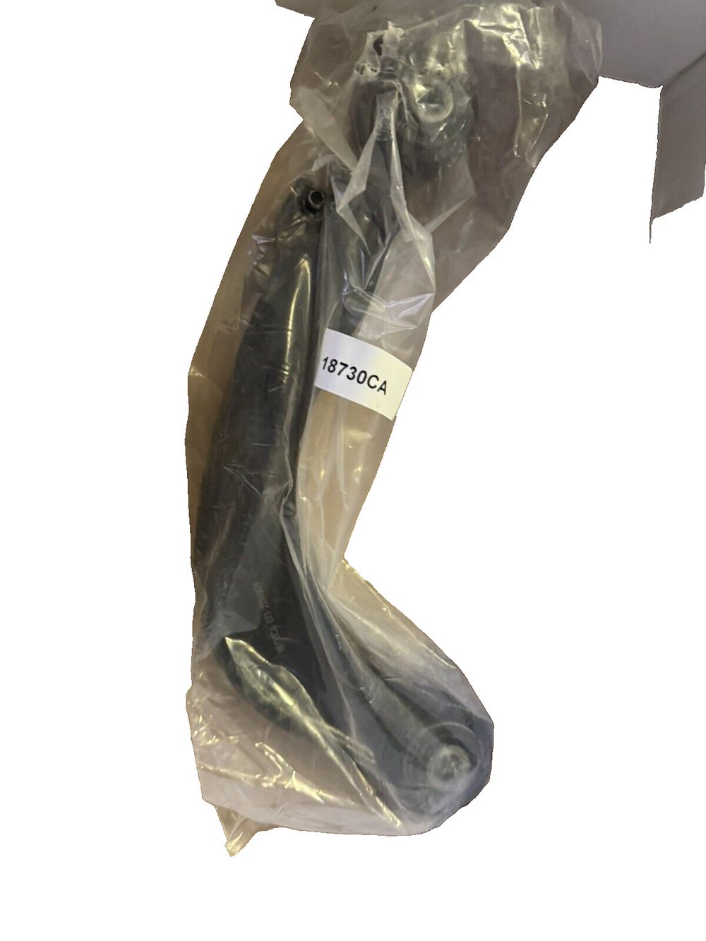 Dorman 522-674 Suspension Control Arm for Select Ford/Mazda/Volvo – a black plastic bag with a white label on it