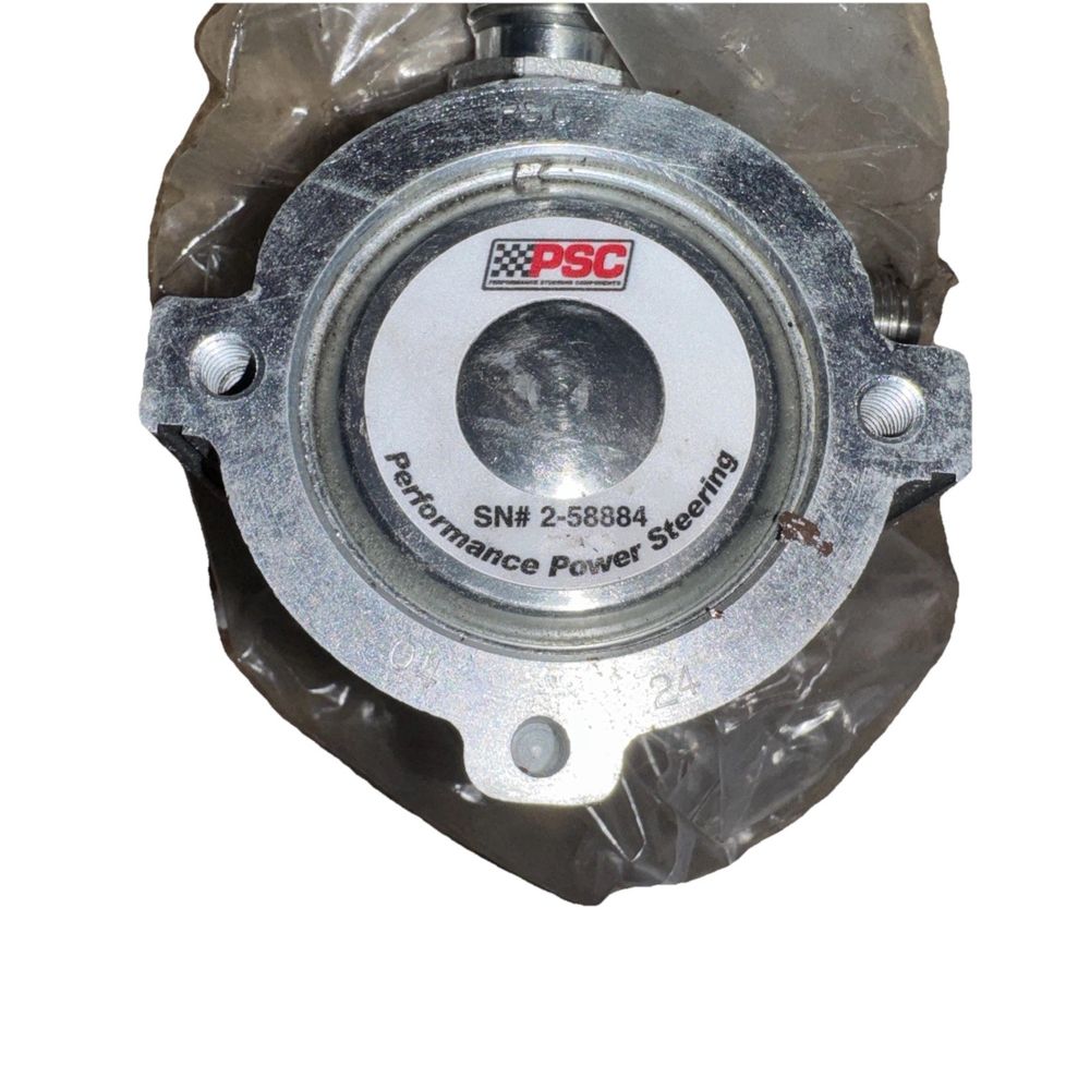 SP33352 - High Flow CBR Power Steering Pump, PSC – a close up of a metal housing with a white background