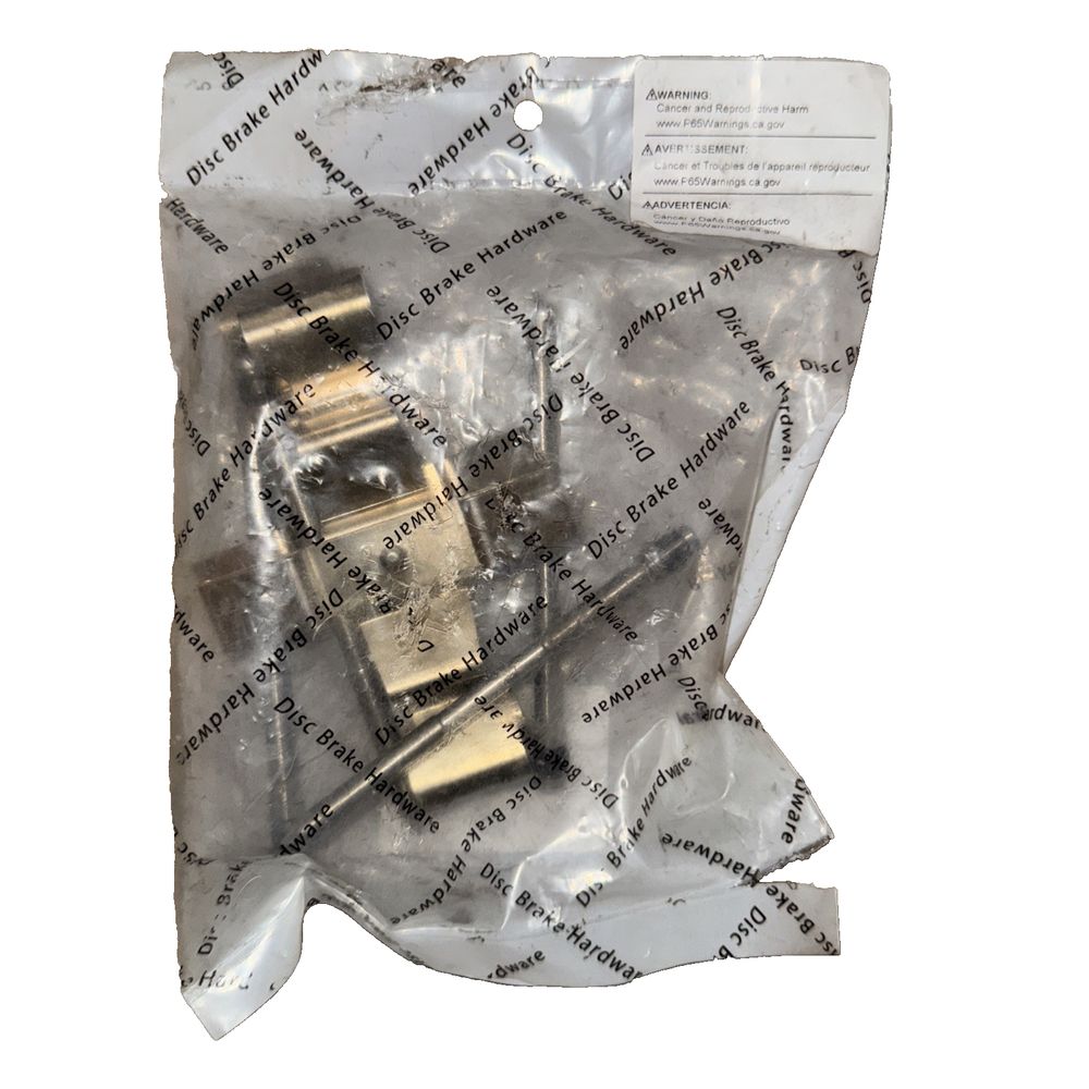 Dynamic Friction 340-21021 - Disc Brake Hardware Kit – a bag of gold colored metal parts