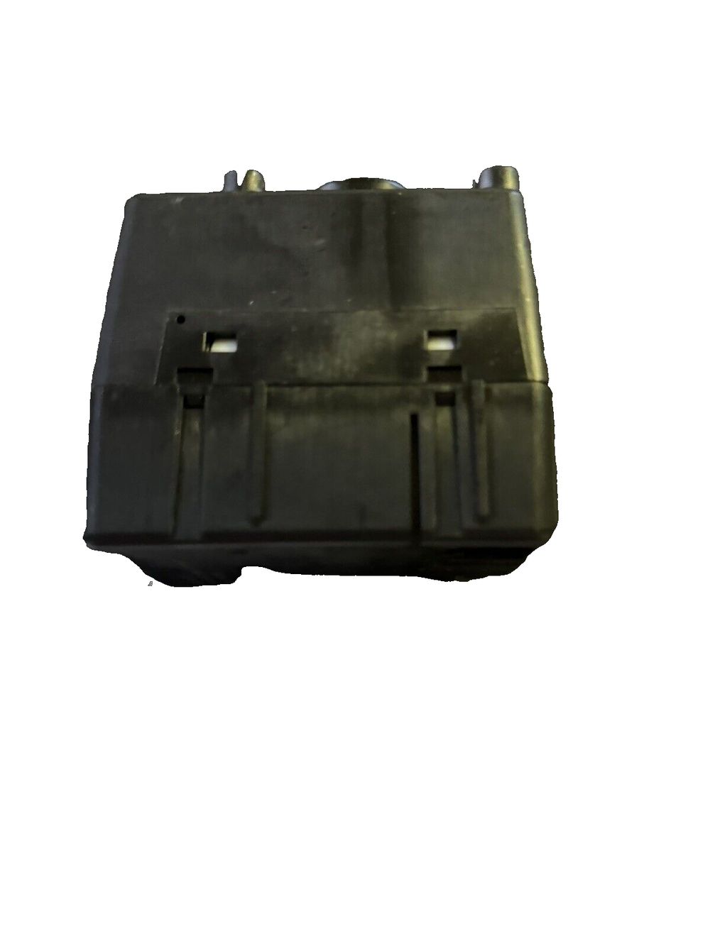 Wireless Chrysler Ignition Module 68105739AC – a black plastic cover for a small device