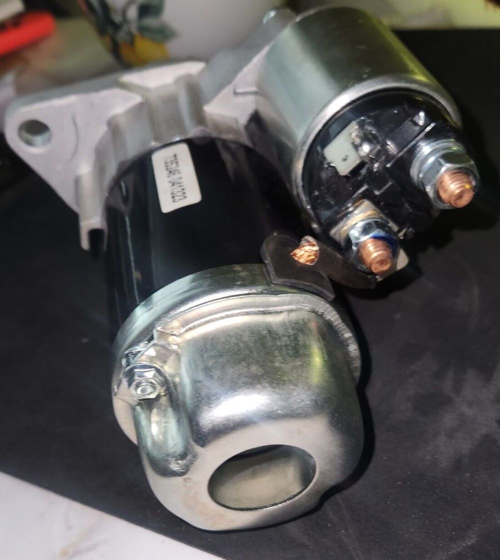DB Electrical 410-48181 Starter Compatible With-Replacement For 2.5L Saab 9-2X 2 – a close up of a metal object on a table