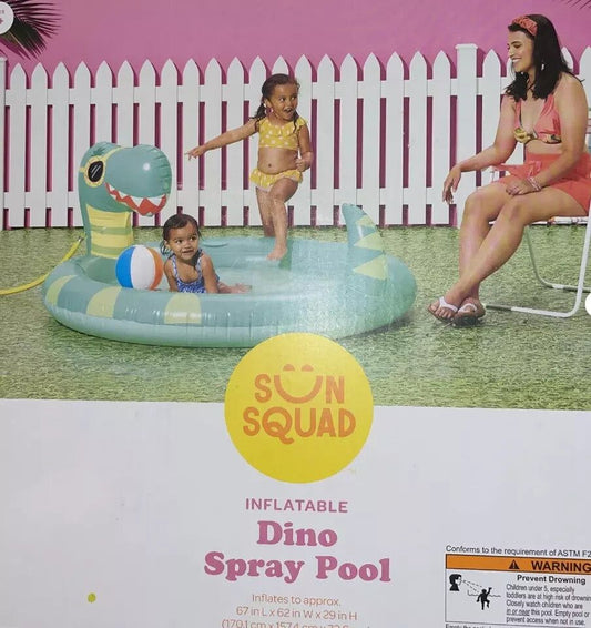 Sun Squad Dino Spray Pool - Fun Inflatable Kiddie Pool with Water Sprayer – a woman and a child are sitting in a pool