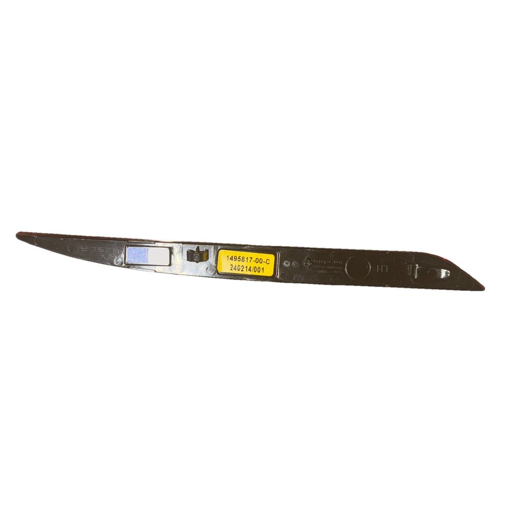 Tesla Left Rear Bumper Reflector PN 1495817-00-C | Genuine OEM – a black plastic ruler with a yellow label