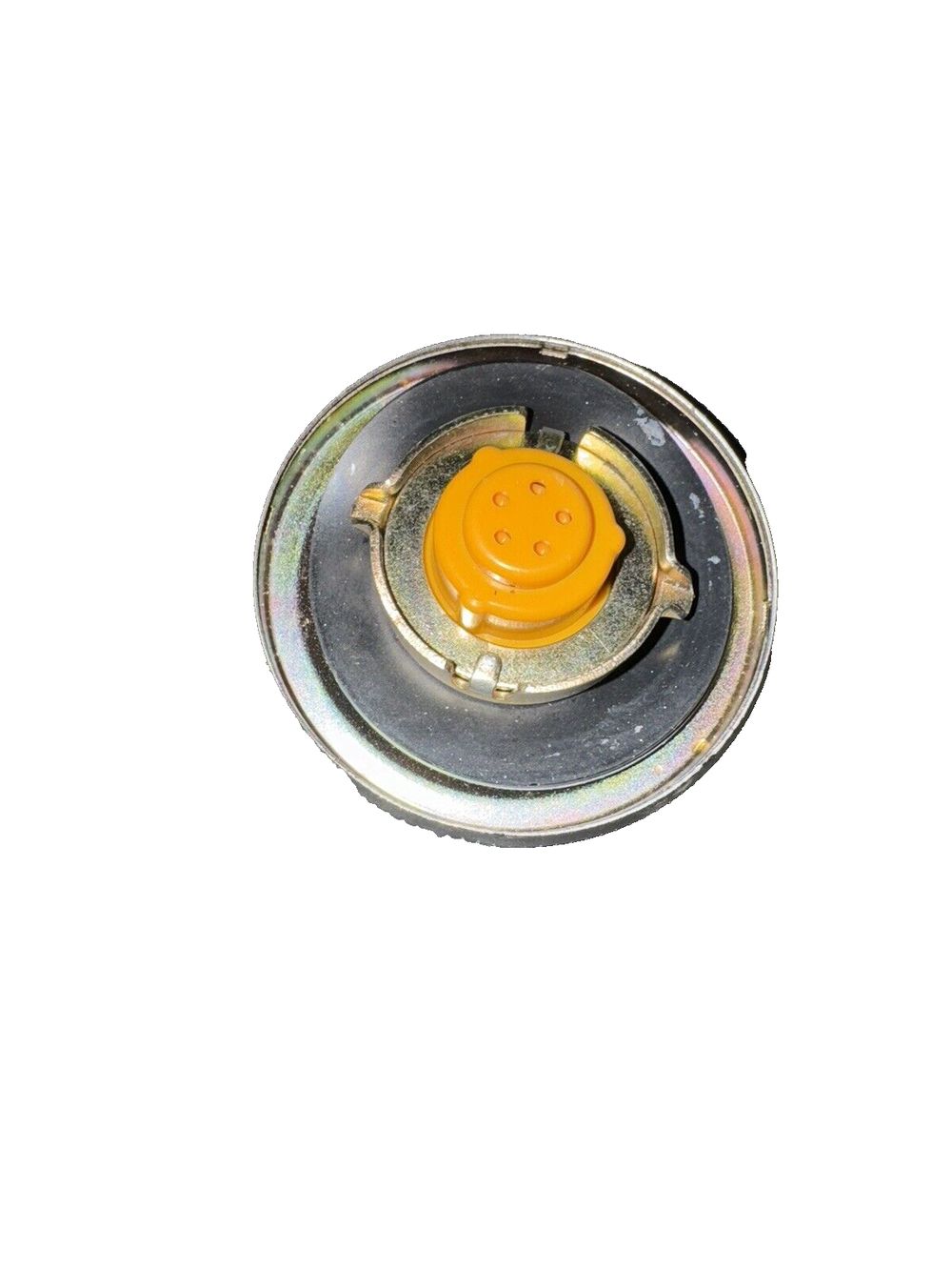 MotoRad MGC23 Fuel Cap - Ford F-150 (75-76) F-100 (53-76) F-250 (53-76) F-350 ( – a yellow light bulb on a white background
