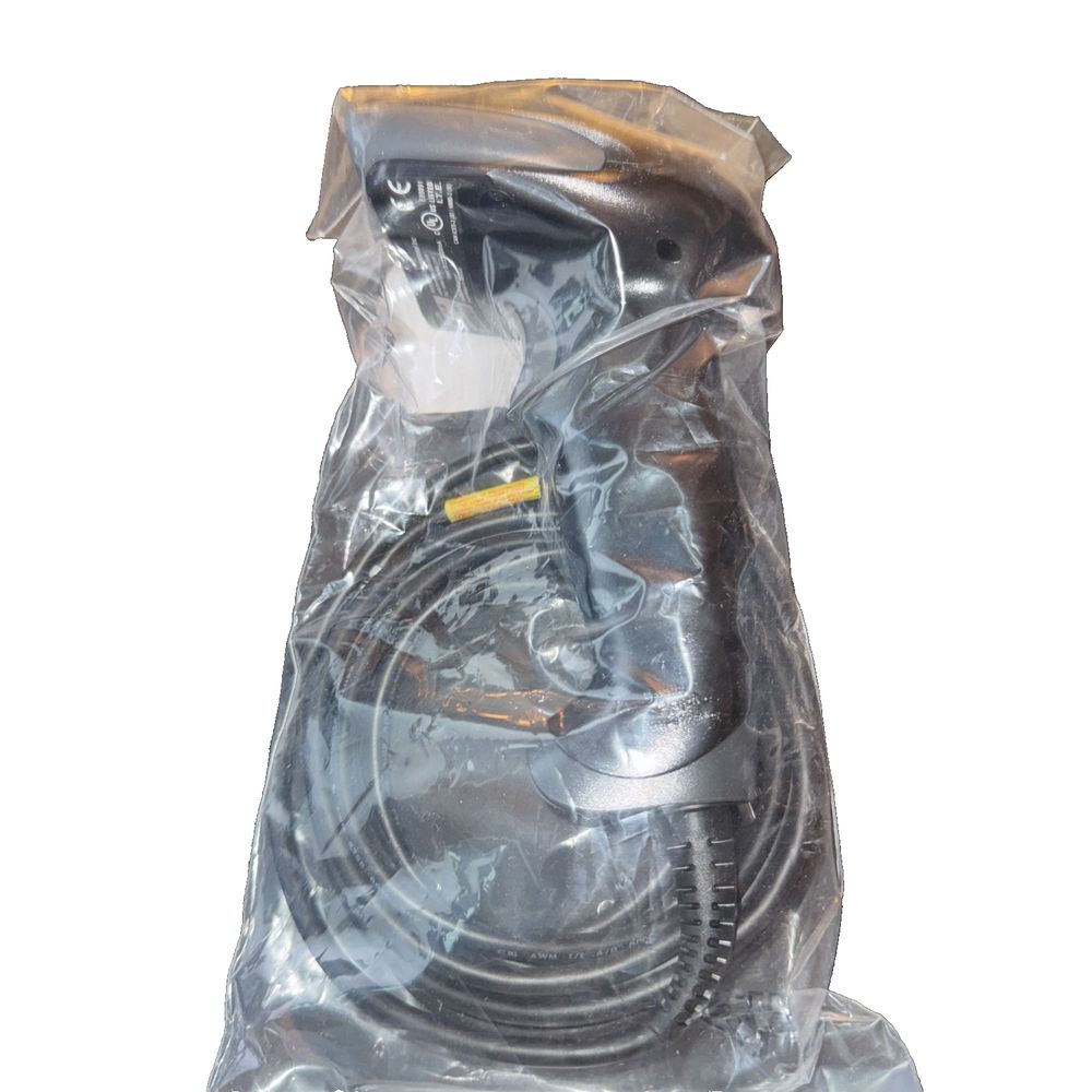 Honeywell 1300g Hyperion General Purpose Scanner – a bag of plastic material with a plastic handle