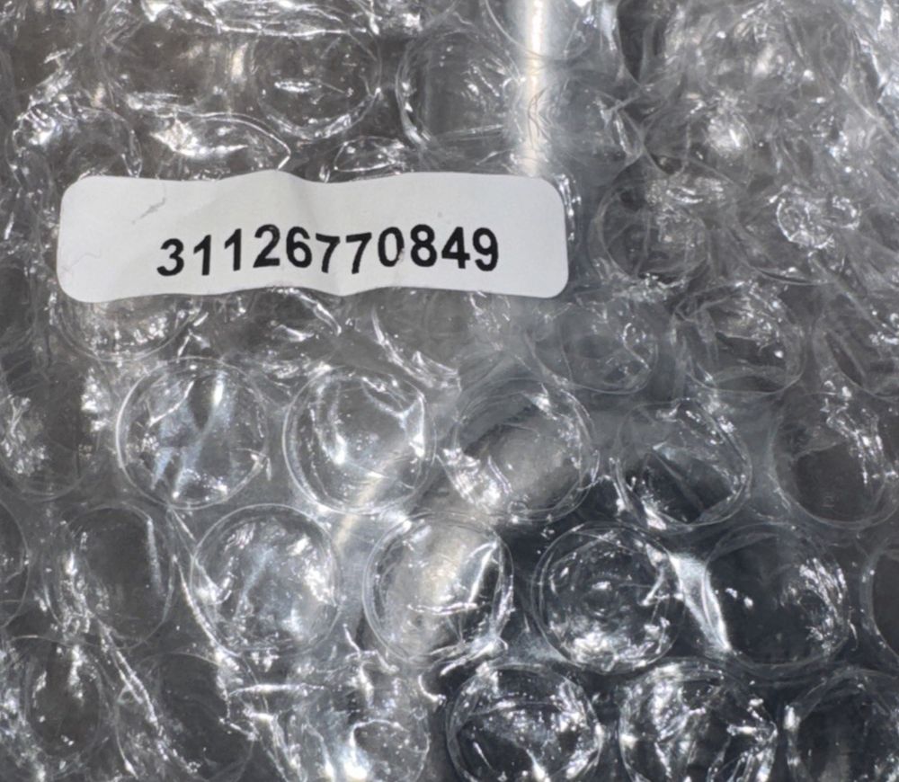 Lower Control Arm 31126770849 – Replacement Part for BMW Vehicles, Unbranded – a pile of plastic cups with a white label