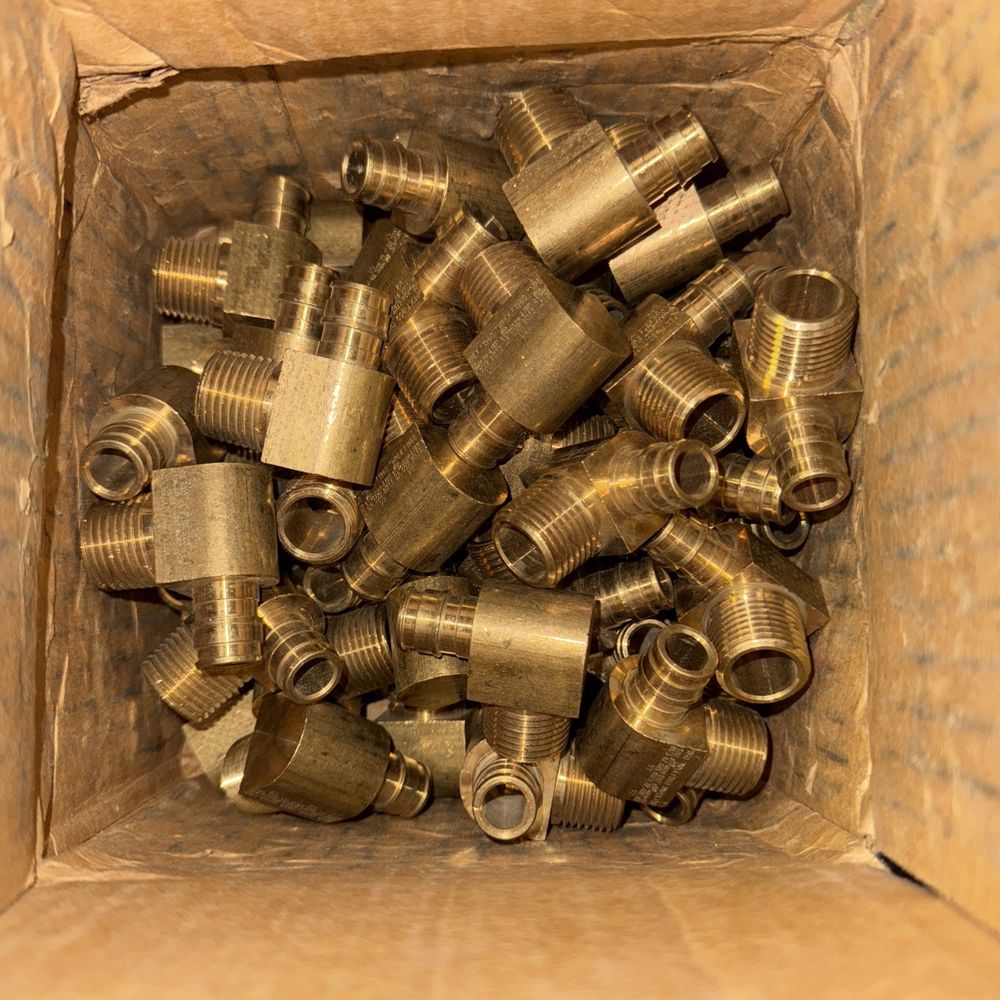 F1960 Fittings 1/2 x1/2" MPT REHAU 49 Pack – a box full of brass fittings