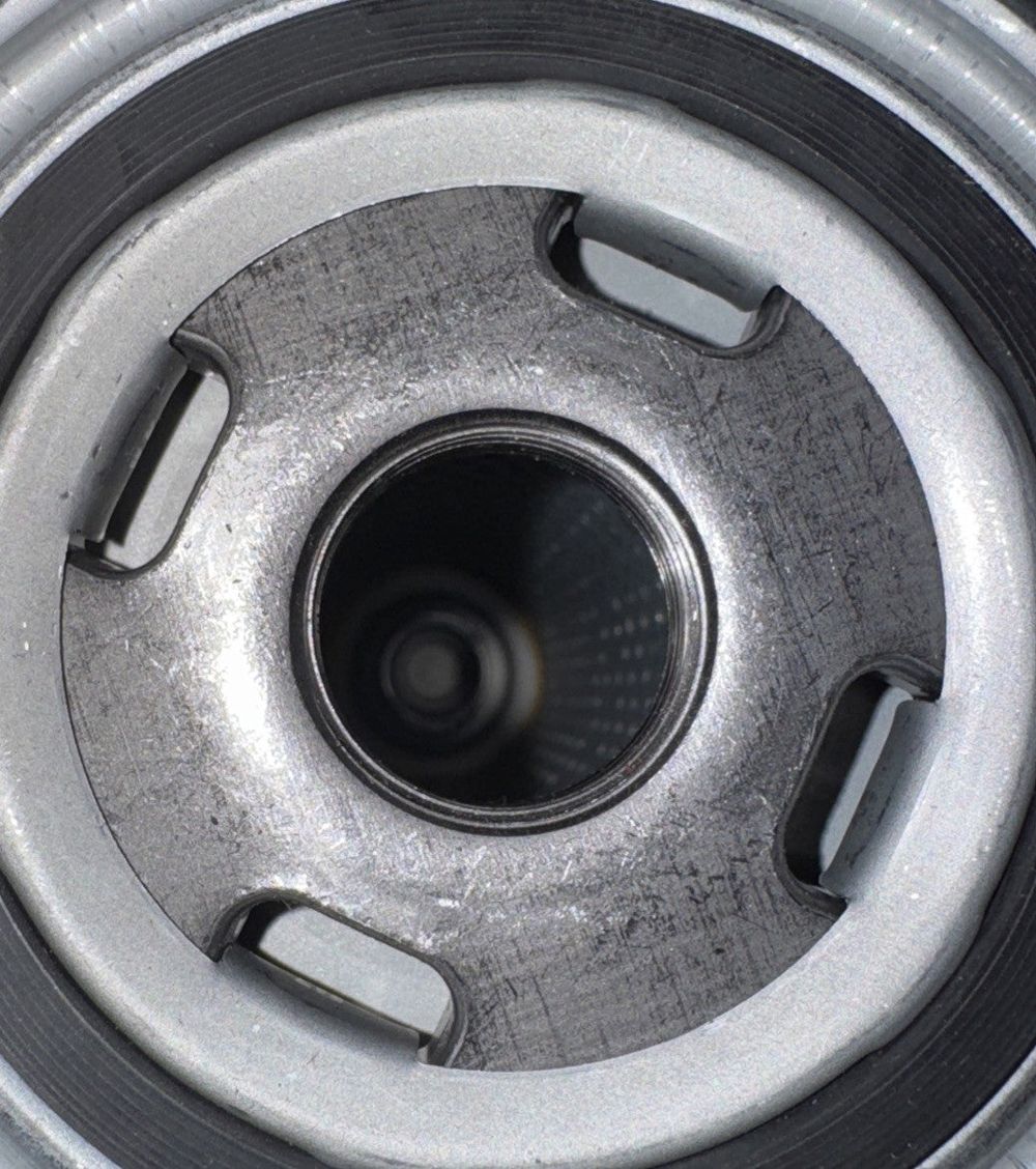 Atlas Copco Oil Filter Replacement - 1625752600 – a close up of a metal object with a hole