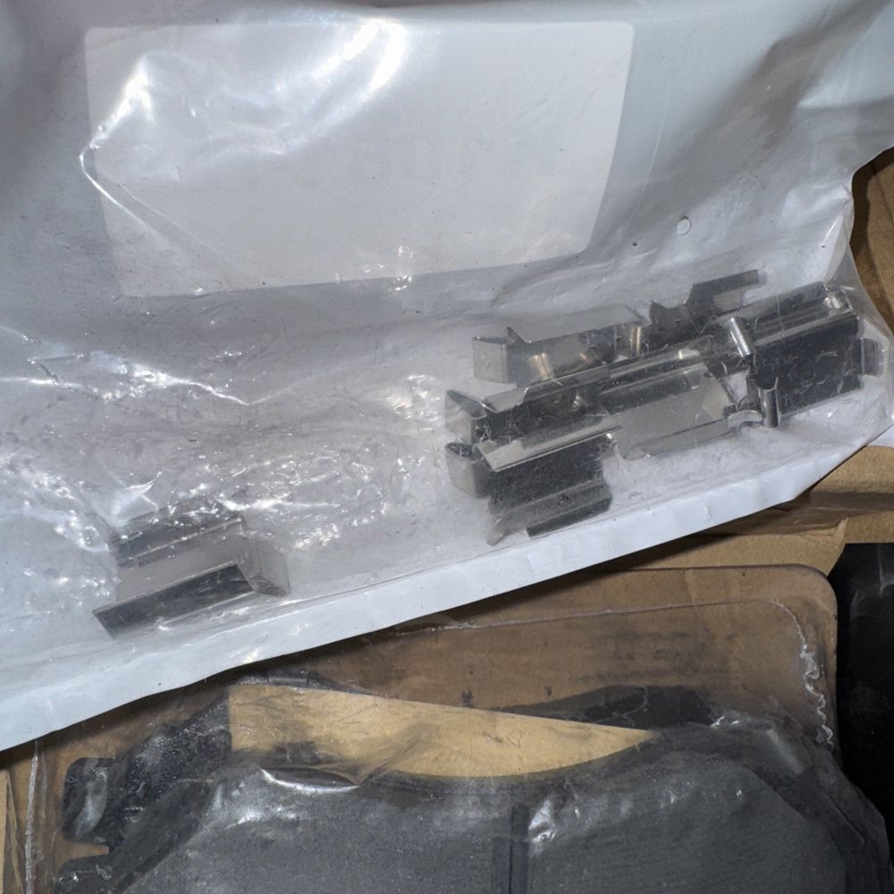 M1273 Ceramic Disc Brake Pads, Elite Max – a box of train cars sitting on a table