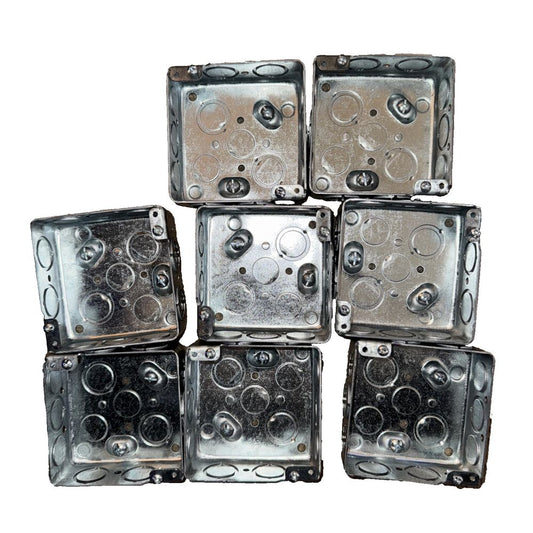 4" Square Electrical Box, 10 1/2" Knockouts 8 Pack, Unbranded – a pile of metal blocks with a white background