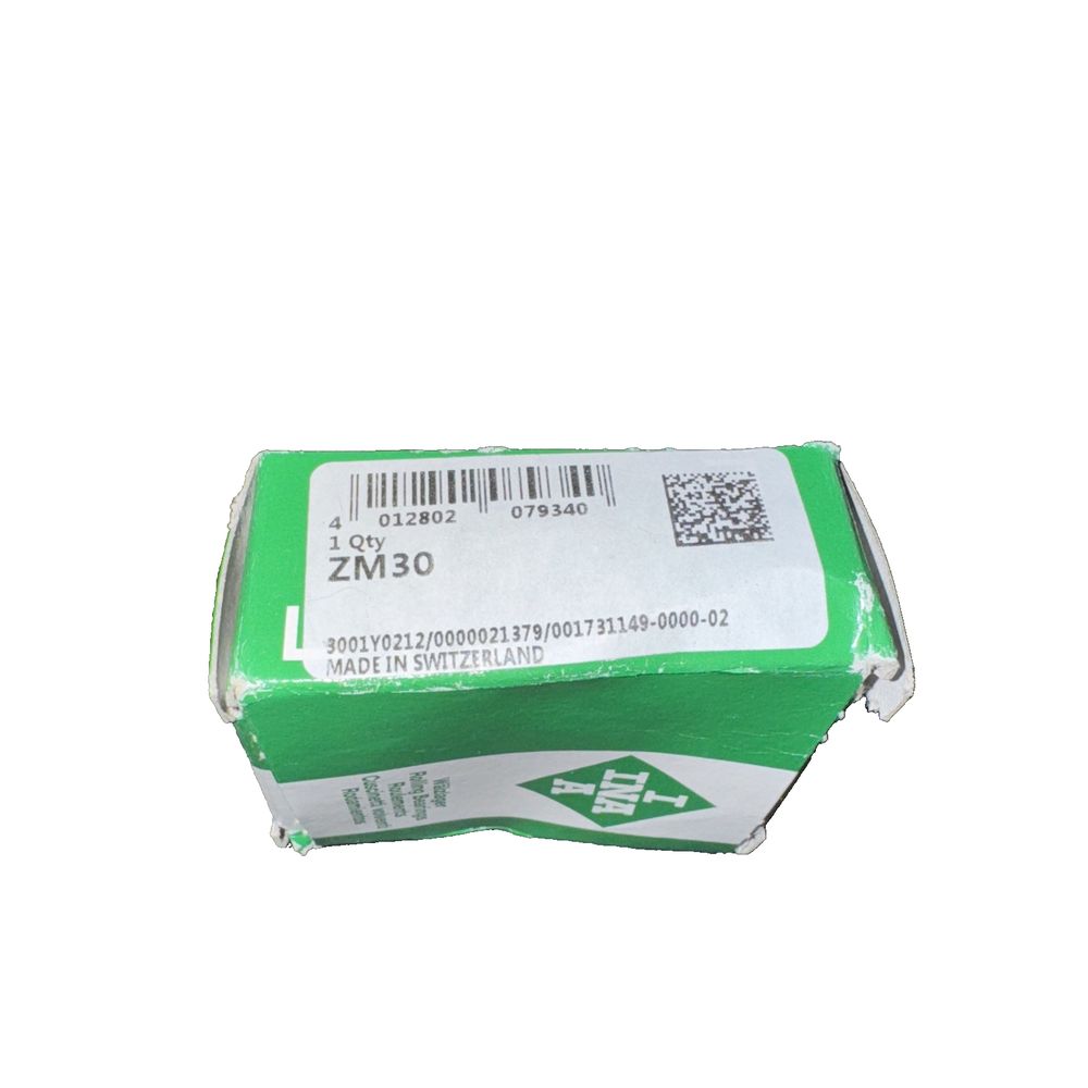 INA ZM30 4012802079340 Locknut – a green battery with a white background