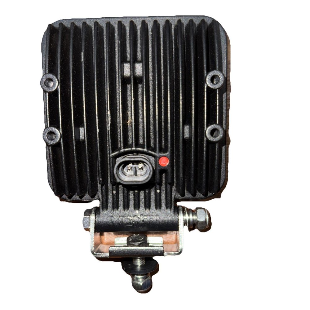 AU.22 Series High Power LED Worklamp with Integrated Superseal Venta (No Cables) – a close up of a motor motor