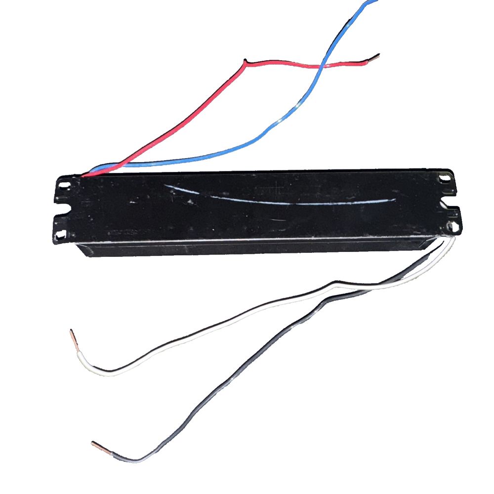 Advance Xitanium XI100C410V024FNS1 LED Driver – 100W, 24V, Reliable & Efficient, DaveyDooDeals – a black battery with wires attached to it