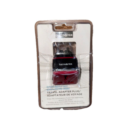 Samsonite Travel Adapter plug Europe/Middle East – a bottle of red liquid in a cardboard box