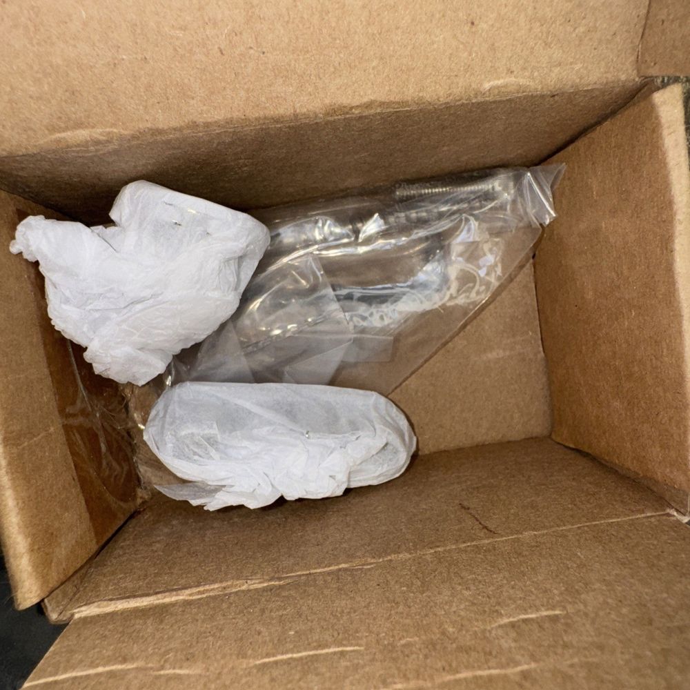 Kohler 1277343-CP Bracket Kit Replacement Service Parts Polished Chrome – a box with a bag of toilet paper inside