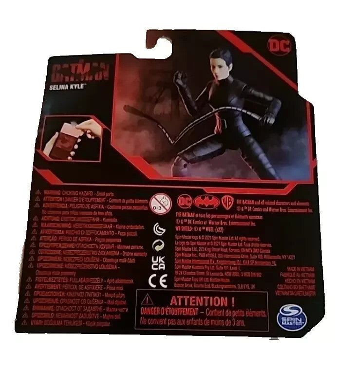 The Batman - Selina Kyle 3.75” Action Figure with 3 Accessories - DC Comics - NE – a box of a toy with a black and red design