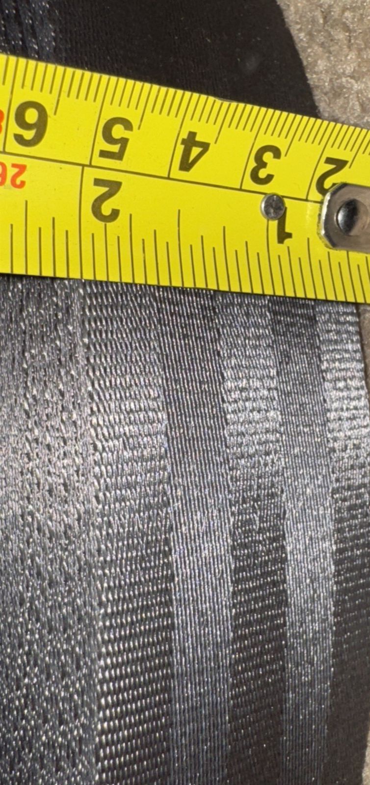 Opperman webbing 100m X2" Gray Webbing/Strap – a tape is wrapped around a black hose