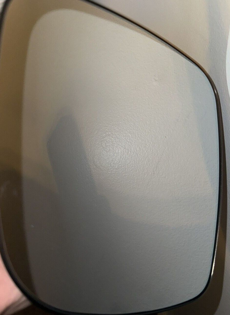 Fit System - 33241 Driver Side Heated Mirror Glass w-Backing Plate, Chrysler Tow – a mirror with a reflection of a person