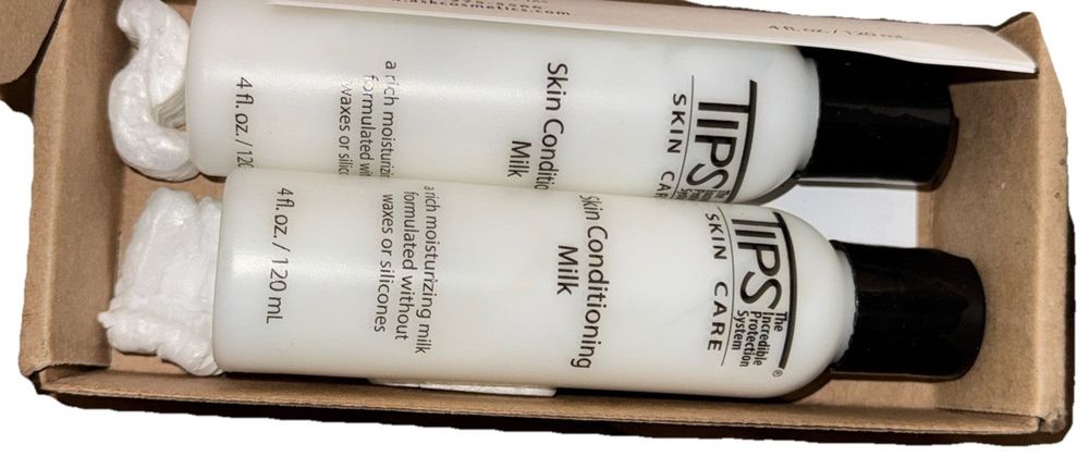 TIPS Skin Conditioning Milk 2 Pk 4 Oz Each, DaveyDooDeals – a box of two bottles of skin care products