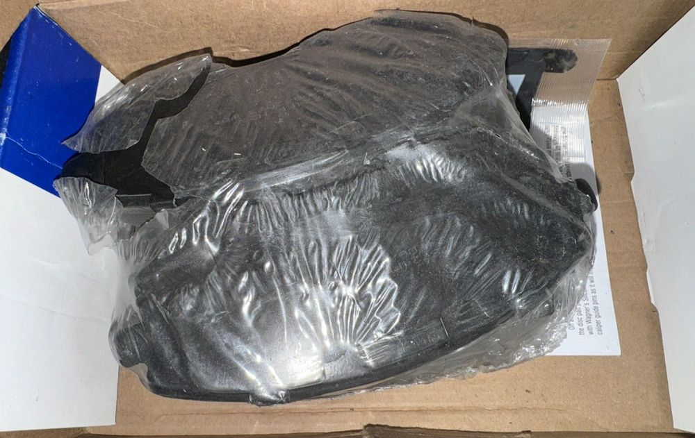 Wagner QuickStop ZD929A Front Disc Brake Pad Set for 2011 Subaru Outback – a box with a black plastic bag inside
