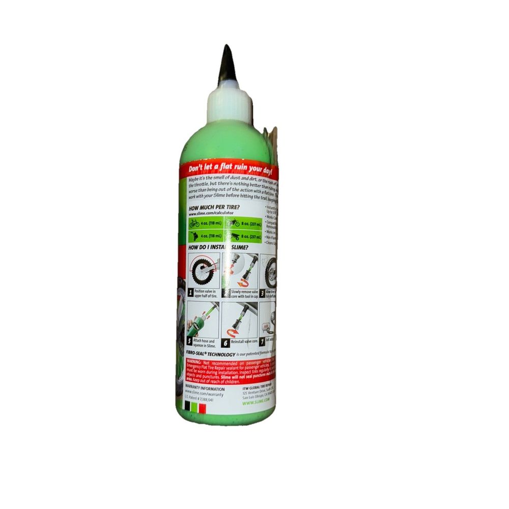 slime prevent and repair tire sealant 16FL oz – a bottle of green glue with a white background