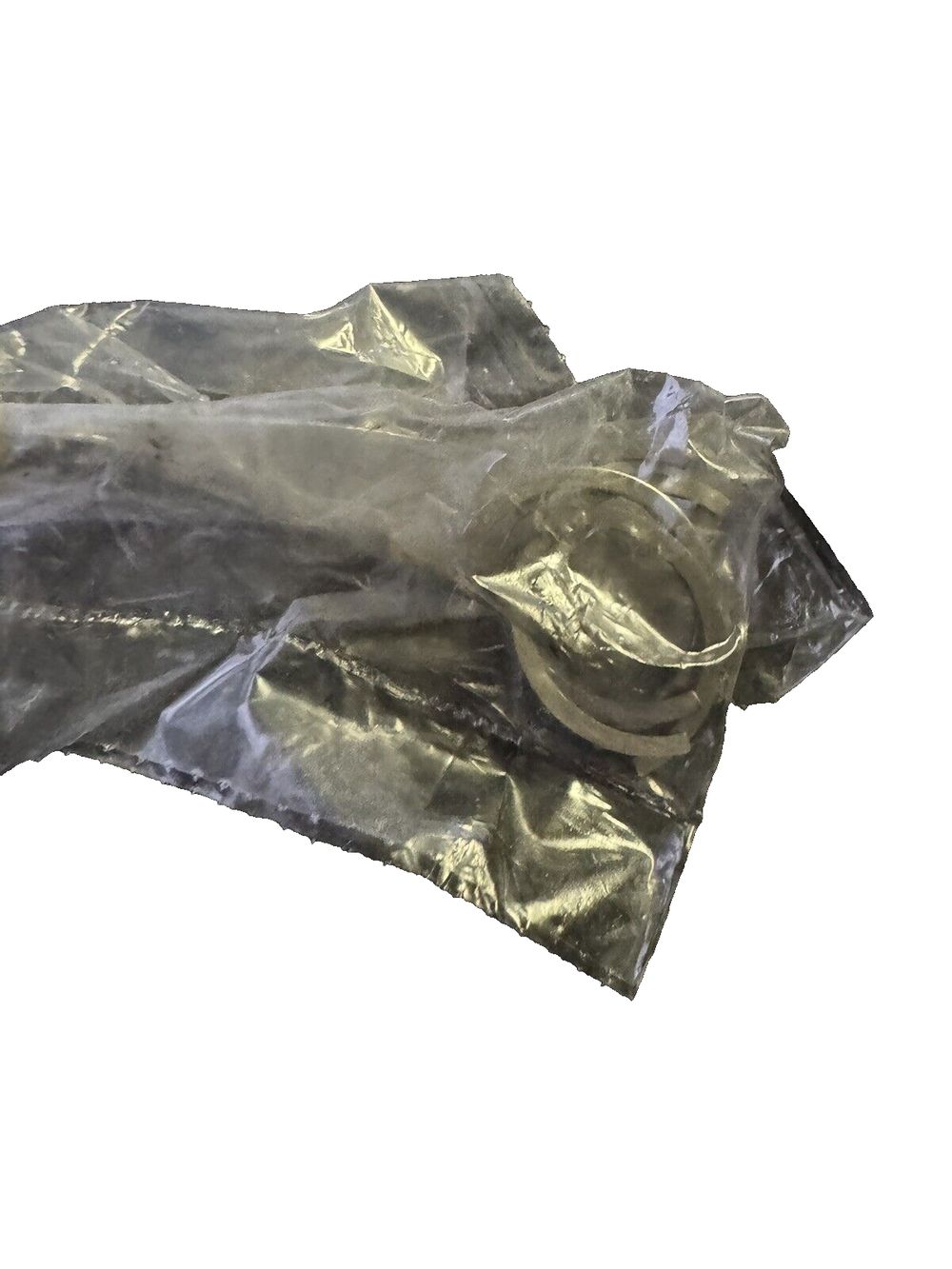 MOOG 371 Non-Greaseable Super Strength Universal Joint for Jeep Wrangler – a black plastic bag with a silver foil on it