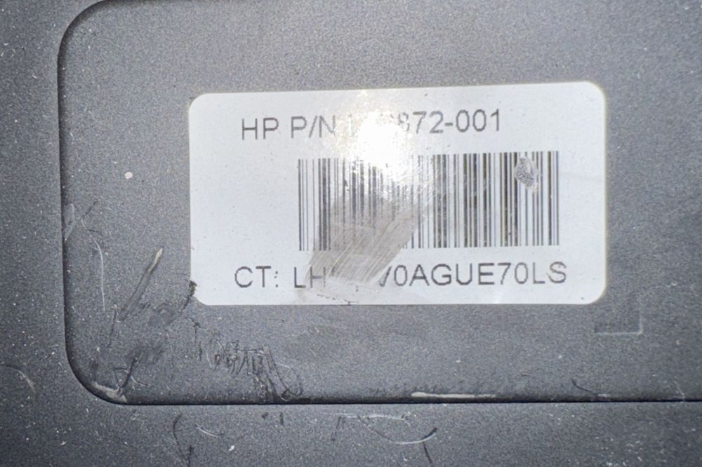 TPC-I027-D HP Engage One W Advanced I/O Base, Black, DaveyDooDeals – a close up of a label on a computer