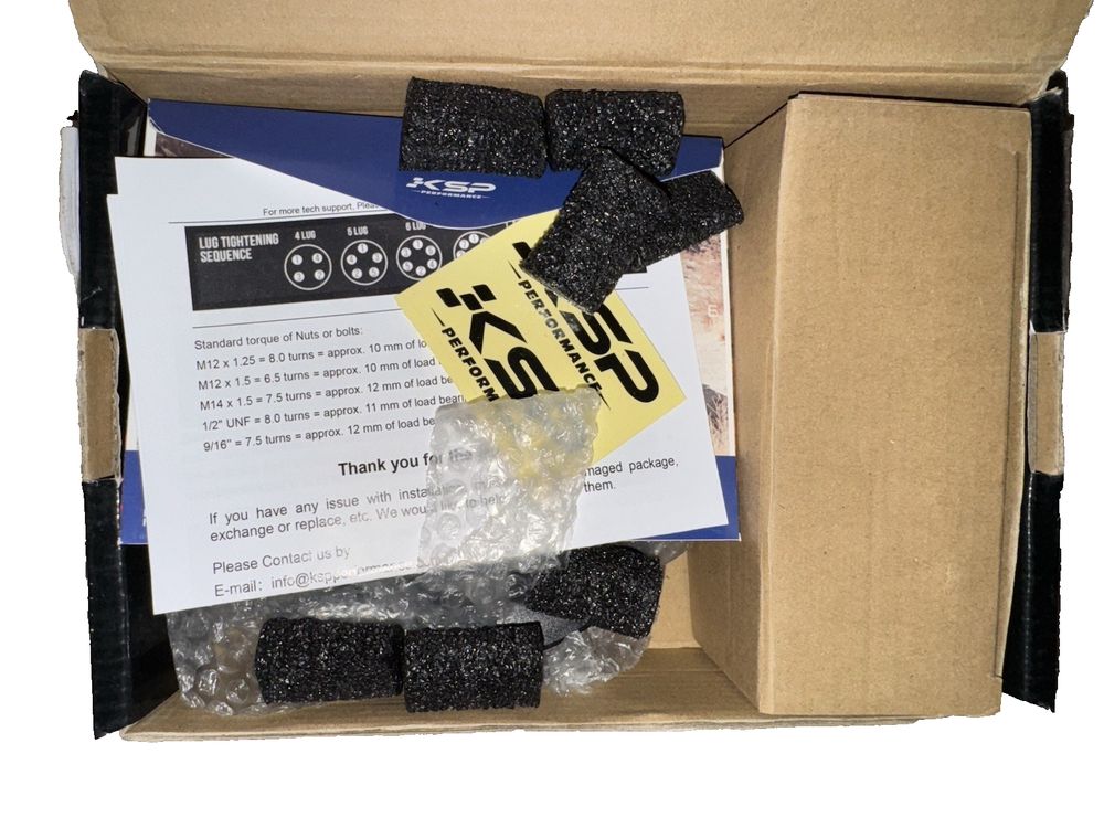 KSP 5X120mm Wheel Spacers, 2PCS 15mm Hubcentric Forged Spacer for E36 E46 E90 E9 – a box with a black bow and a note