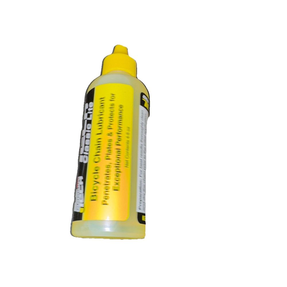 Lube Dumonde Tech Classic LiteChain Lube 4 oz – a yellow bottle of glue glue