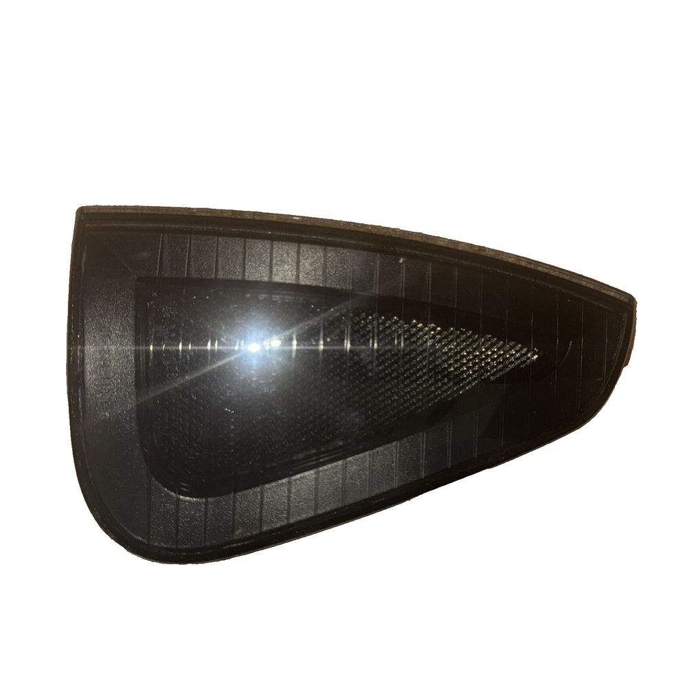 08-334-1403l-B Side Marker Light Assembly Front Left Black Dodge Charger, Unbranded – a close up of a black car mirror