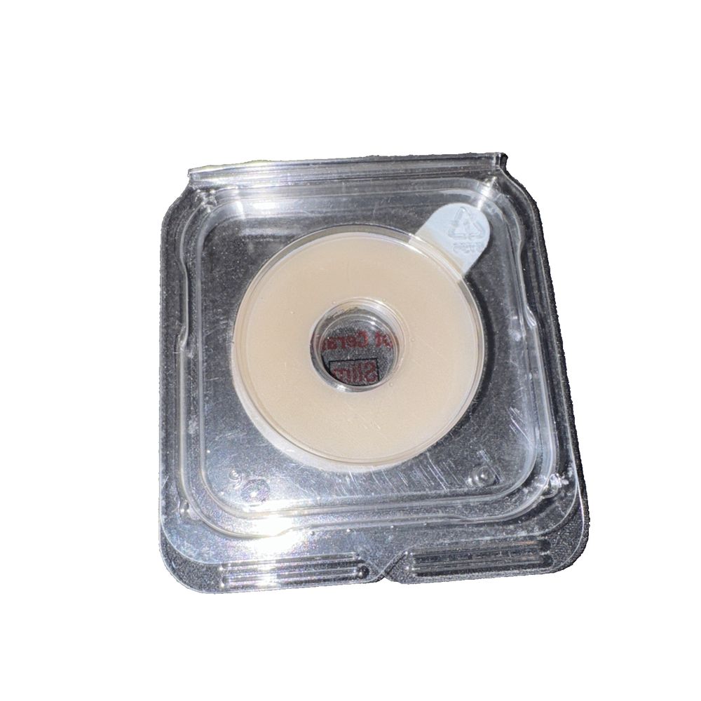 Hollister 8815 Adapt CeraRing Barrier Ring – a plastic container with a white lid