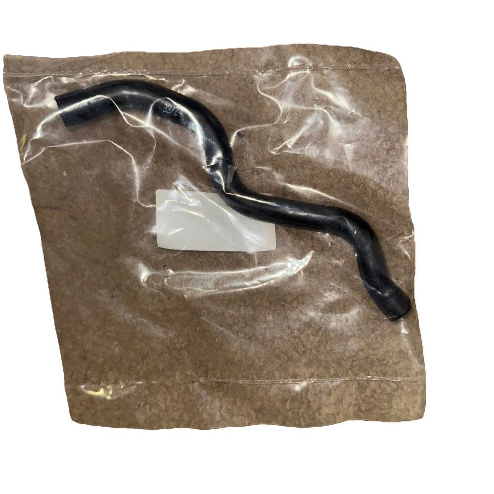 Mercedes-Benz Breather Hose Top Section - 1120180382, DaveyDooDeals – a black snake laying on a piece of plastic