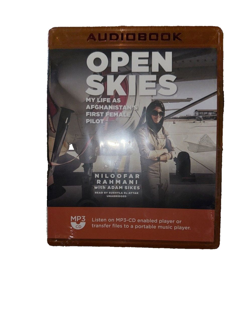 Open Skies: My Life as Afghanistan's First Female Pilot Auidio Book, DaveyDooDeals – a dvd with a picture of a man in a plane