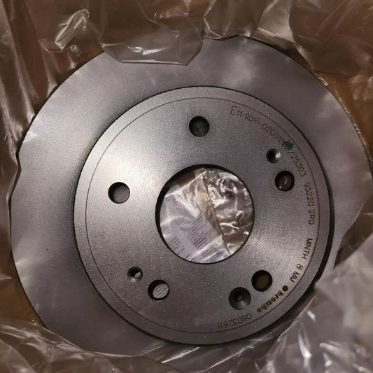 Brembo 08D32611 Rear Brake Rotor for HONDA OE 42510T7WA01 - UV Coated Solid Desi – a close up of a metal disc