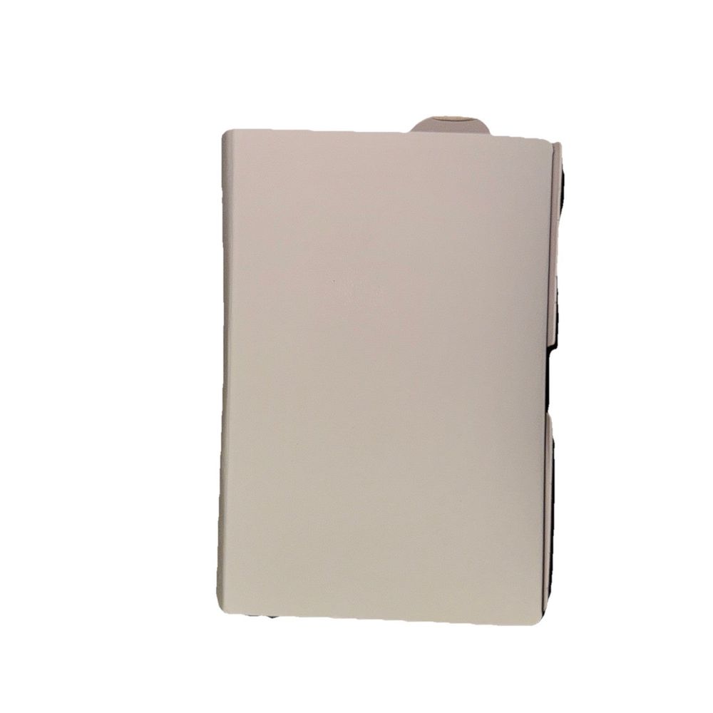Belkin Secure Holder with Wire Cable for AirTag – a white notebook with a black cover