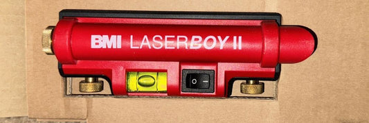 BMI Laserboy II 30 m – a red air compressor is in a cardboard box