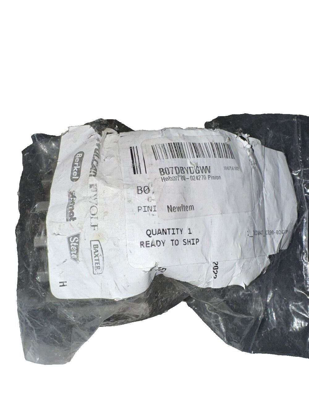 Hobart 00-024270 Pinion teeth replacement part – a bag of paper with a barcode label