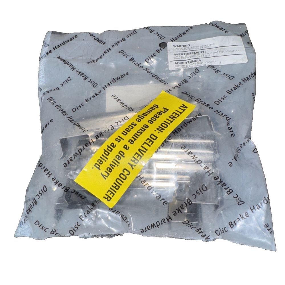 Dynamic Friction Company 340-47047 Disc Brake Hardware Kit – a yellow plastic bag with a yellow label on it