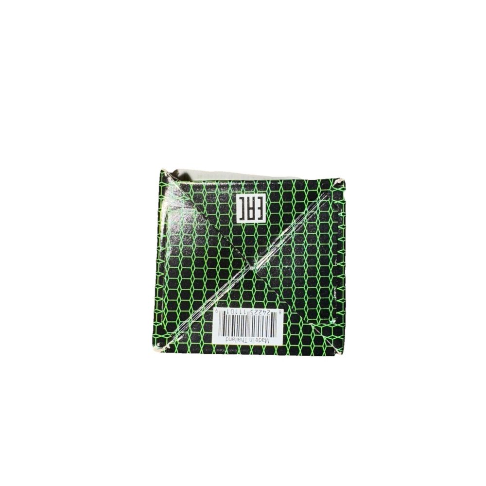 HiFloFiltro Oil Filter - HF207 – a green and black patterned bag with a white stripe