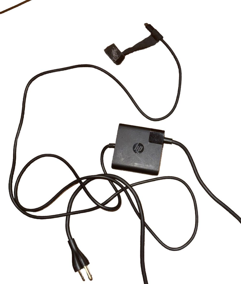 Genuine HP 65W USB C Power Adapter for X360 TPN-AA03 – a black power cord with a white background