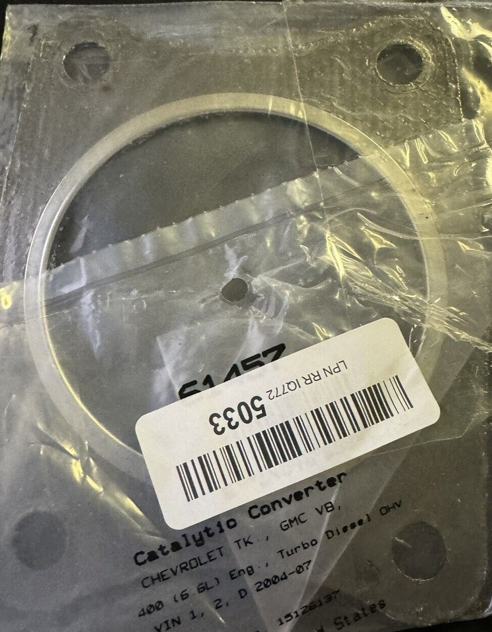 FEL-PRO 61457 Exhaust Pipe Gasket – a piece of plastic tape with a label on it