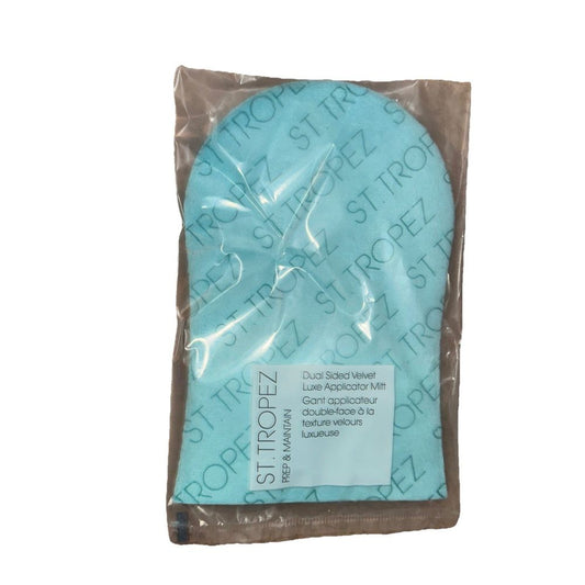 Dual Sided Luxe Applicator Mitt, ST. Tropez – a blue plastic bag with a white plastic bag on it