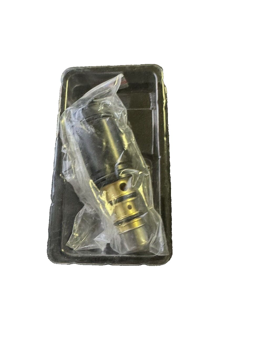Universal Air Conditioner EX 10514C A-C Compressor Control Valve, Black – a small plastic box with a small plastic container