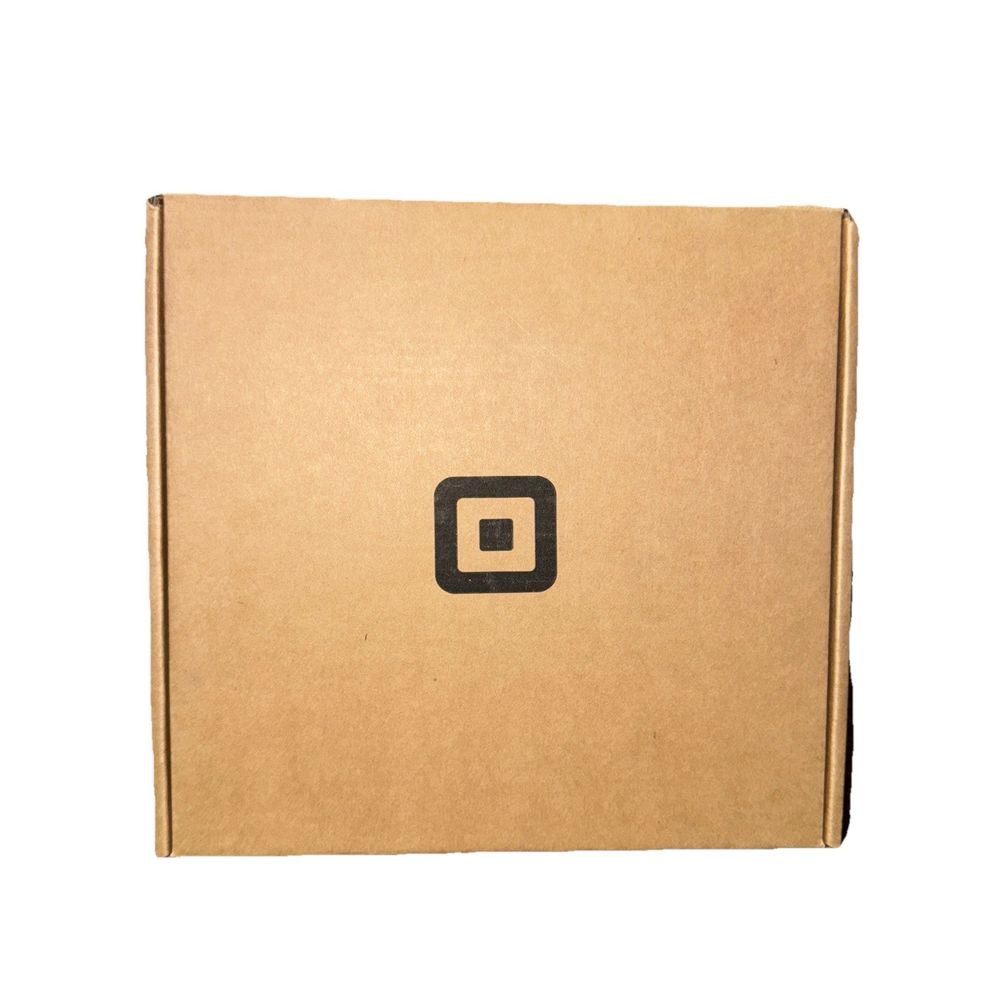 Square Pos SPS4-01-A (No Cords/Accessories) – a brown box with a black letter g on it