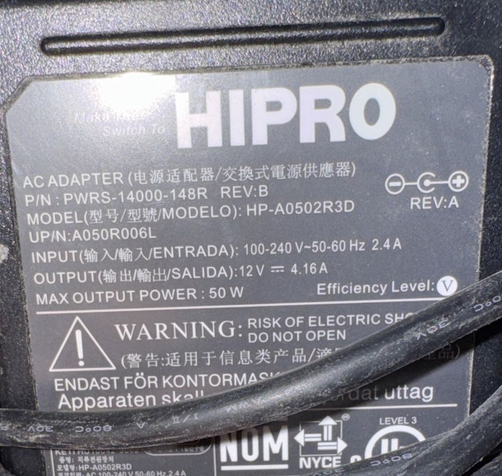 Hipro PWRS-14000-148R Ac Adapter, Hi-PRO – a close up of a black and white label on a black and white label