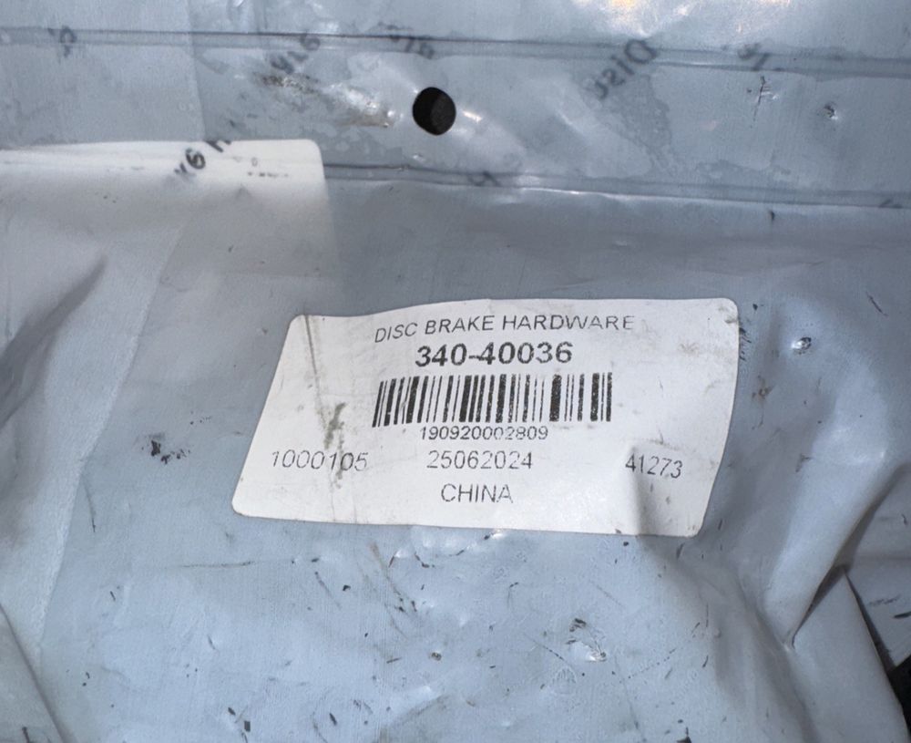 DFC 340-40036 - Front Disc Brake Hardware Kit – a white bag with a barcode on it
