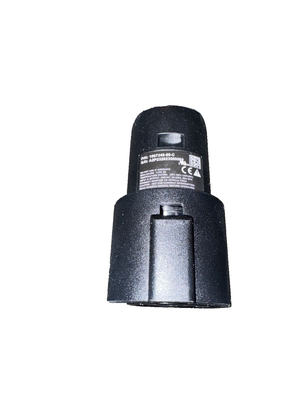 1067348-00-c Charging Adapter, Unbranded – a black plastic adapt for a camera
