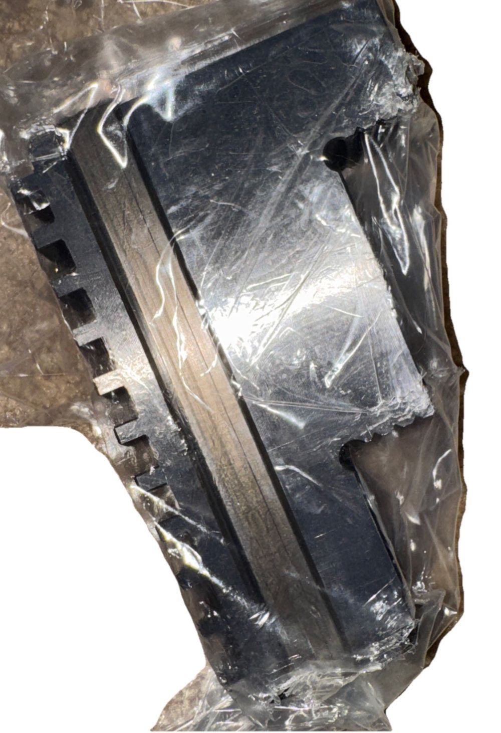 Bison drill jaw set SJZ 400/3 (Comes with all 3), Bison Designs – a piece of plastic wrapped around a metal object