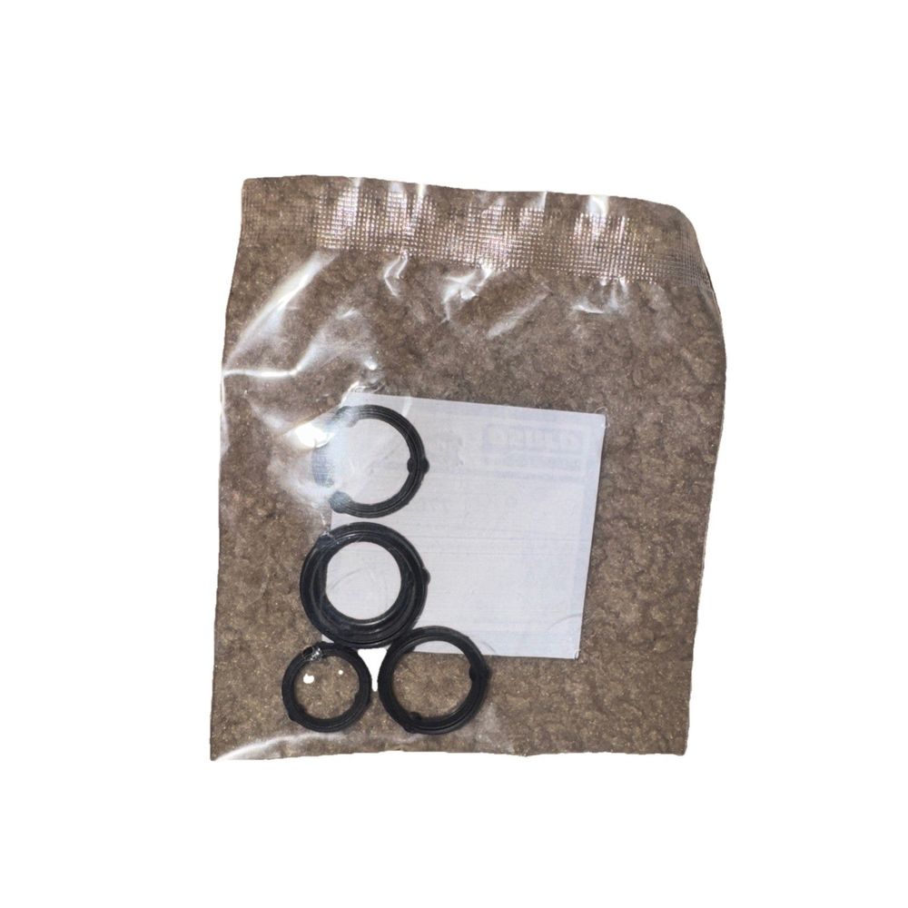 Ajusa Engine Oil Cooler Gaskets 77005200 – a bag of brown colored material with a black ring
