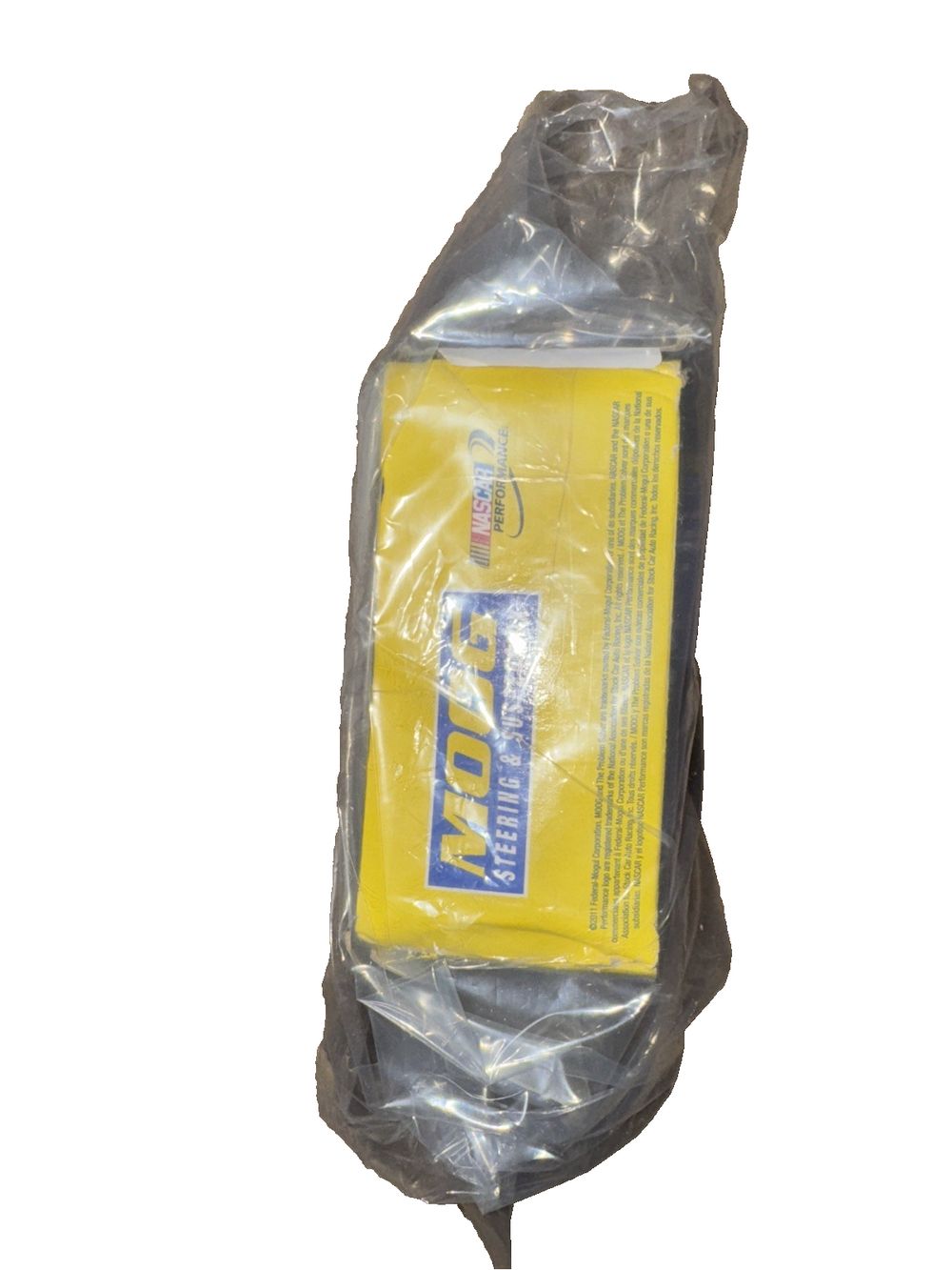 MOOG K7403 Suspension Ball Joint UPC 080066320618 – a yellow plastic bag with a white label on it